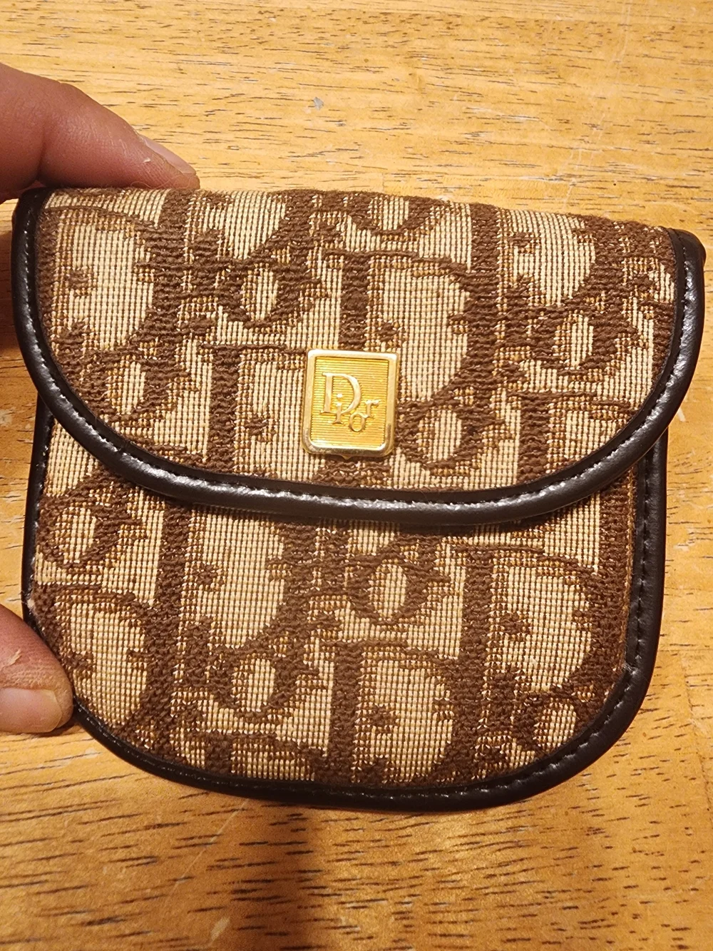 vintage Christian Dior coin purse features the iconic brown Trotter canvas mono